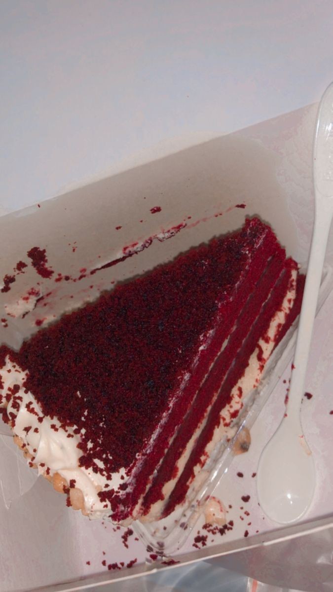 Red velvet cake slice with cream